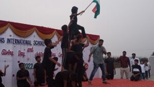 Boys Pyramid Holding Flag in Thanks Giving at RISHS International CBSE School Arcot