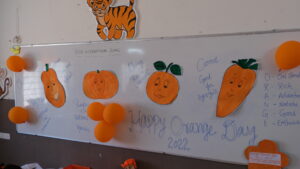 Decorated Board With Orange themed things at RISHS International CBSE School Arcot
