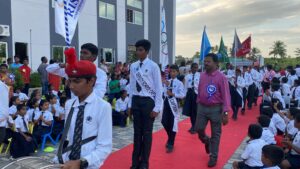 March past by students during the Investiture ceremony at RISHS International CBSE School Arcot
