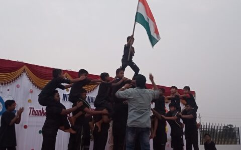 Pyramid Sports Holding Flag in Thanks Giving at RISHS International CBSE School Arcot