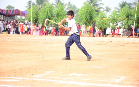 Silambam Performed by a student on Sports Day at RISHS International CBSE School Arcot
