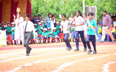 Torch bearers relay during Sports Day at RISHS International CBSE School Arcot